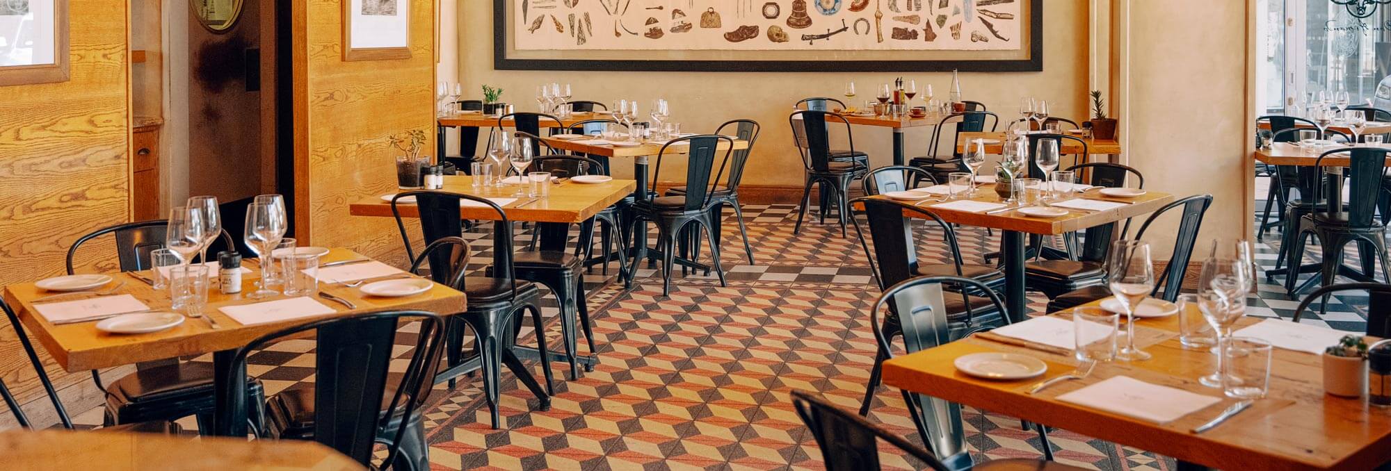 Don Armando restaurant dining room with tables set for service