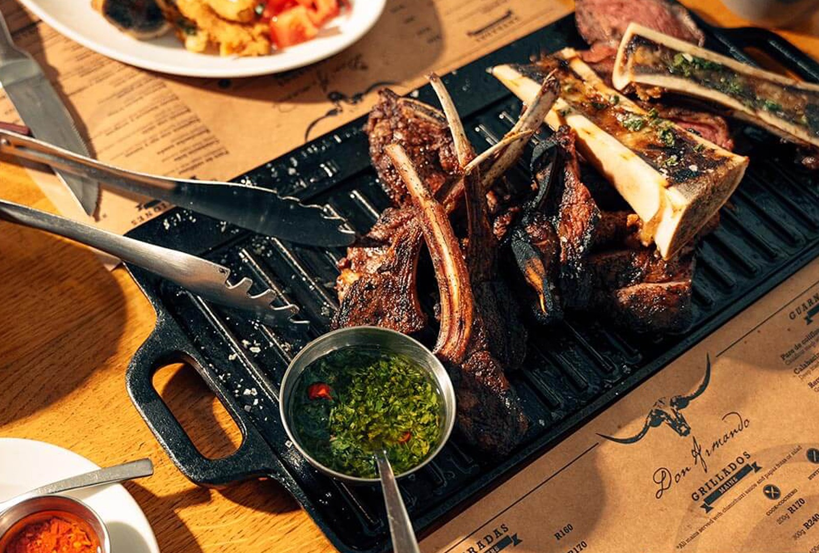 Don Armando grilled meat served with chimichurri